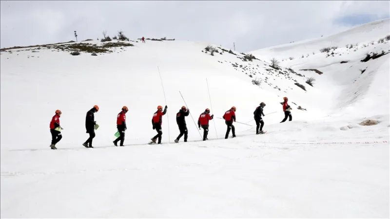 Rigorous training in the snow for a volunteer search and rescue team to respond to avalanches